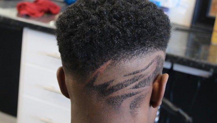 20 coupes de dégradé pour les cheveux bouclés des hommes