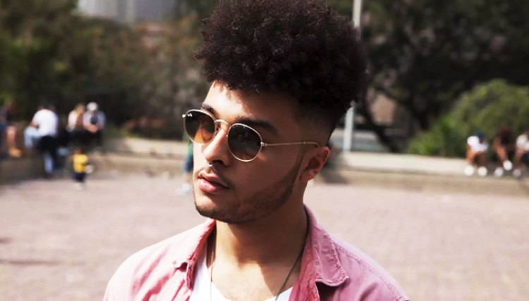 20 coupes de dégradé pour les cheveux bouclés des hommes